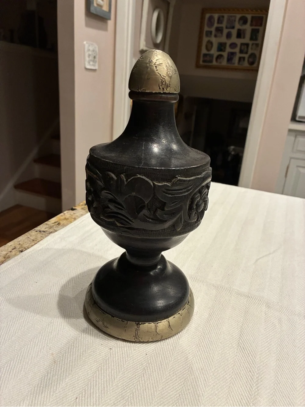 Vintage hand-carved black wood and metallic-accented decorative finial